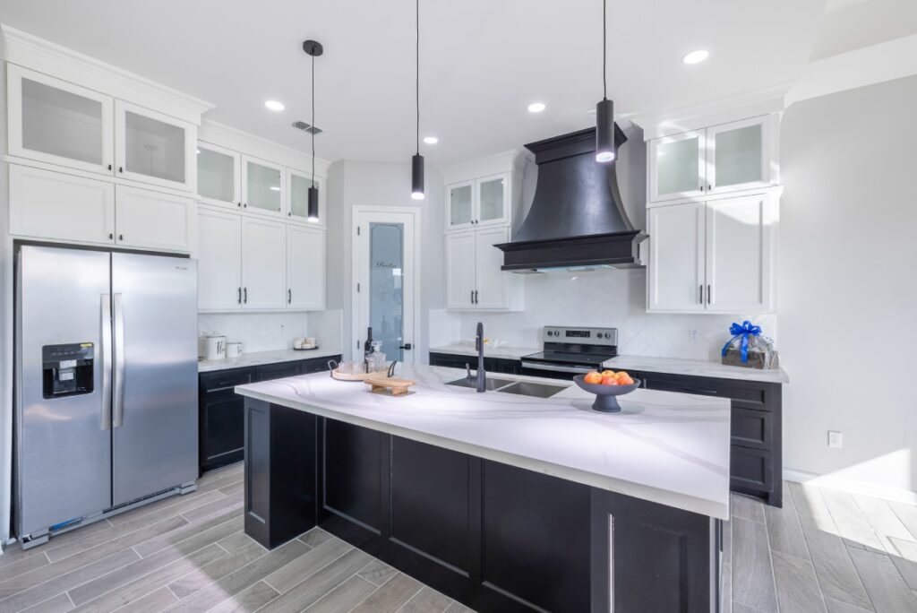 Large kitchen with center island, stainless steel appliances, and smart kitchen technology