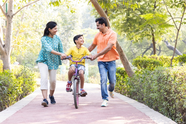 Happy family having fun at park